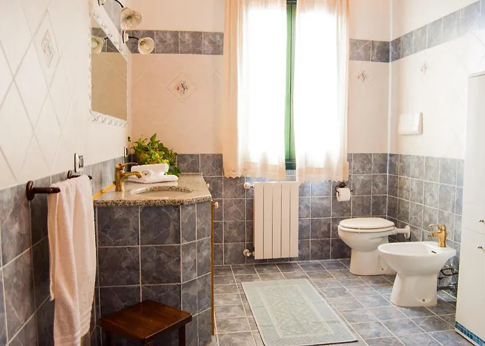 Aurora Habitación en casa particular Olbia